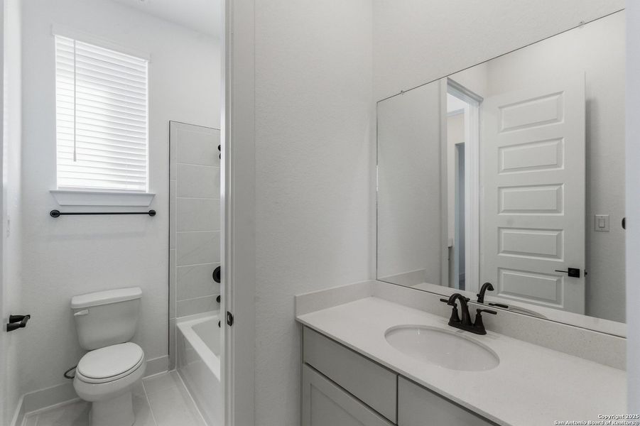 Furnished interior view inside a new home in Sienna Lakes, San Antonio (Image 11).