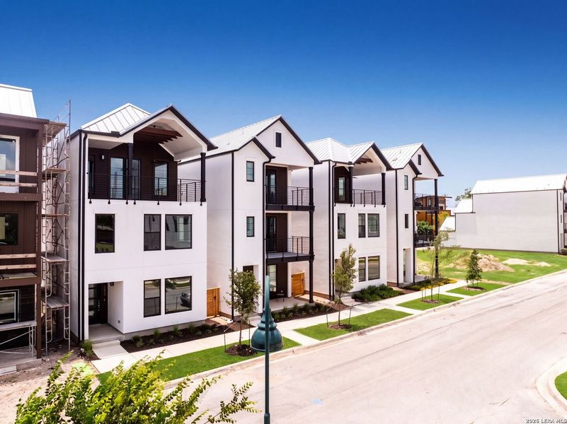 Front exterior of a new home in Victoria Commons, San Antonio, TX, highlighting curb appeal (Image 28). Front exterior of a new home in Victoria Commons, San Antonio, TX, highlighting curb appeal (Image 28).
