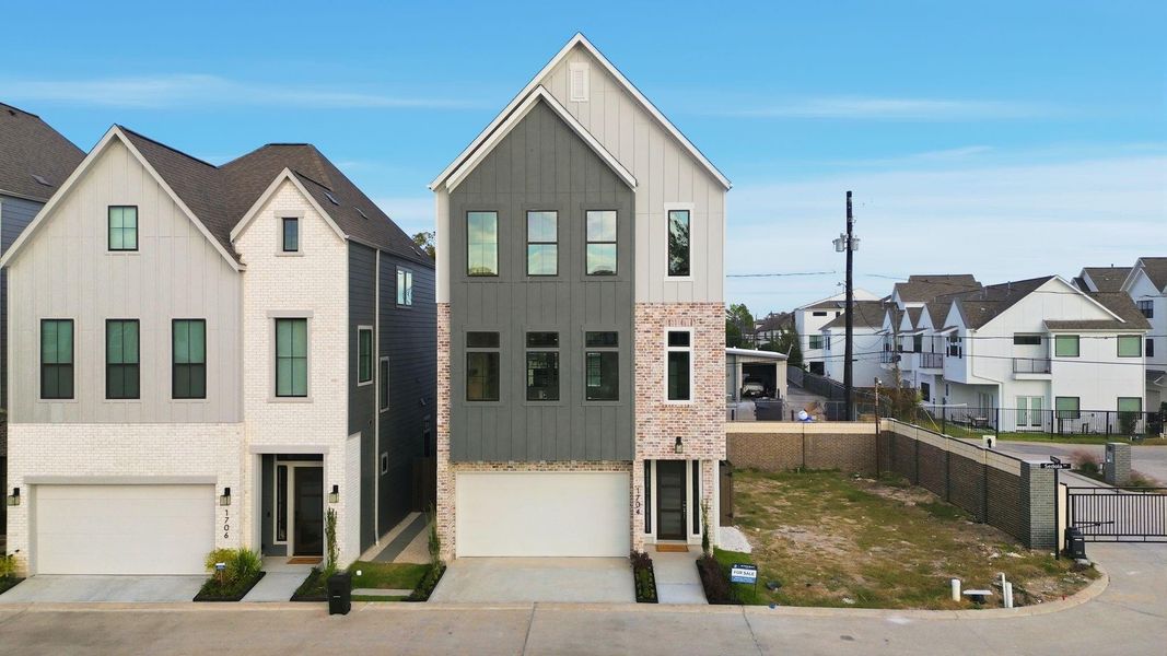 Front exterior of a new home in Spring Valley Creek, Houston, TX, highlighting curb appeal (Image 17).