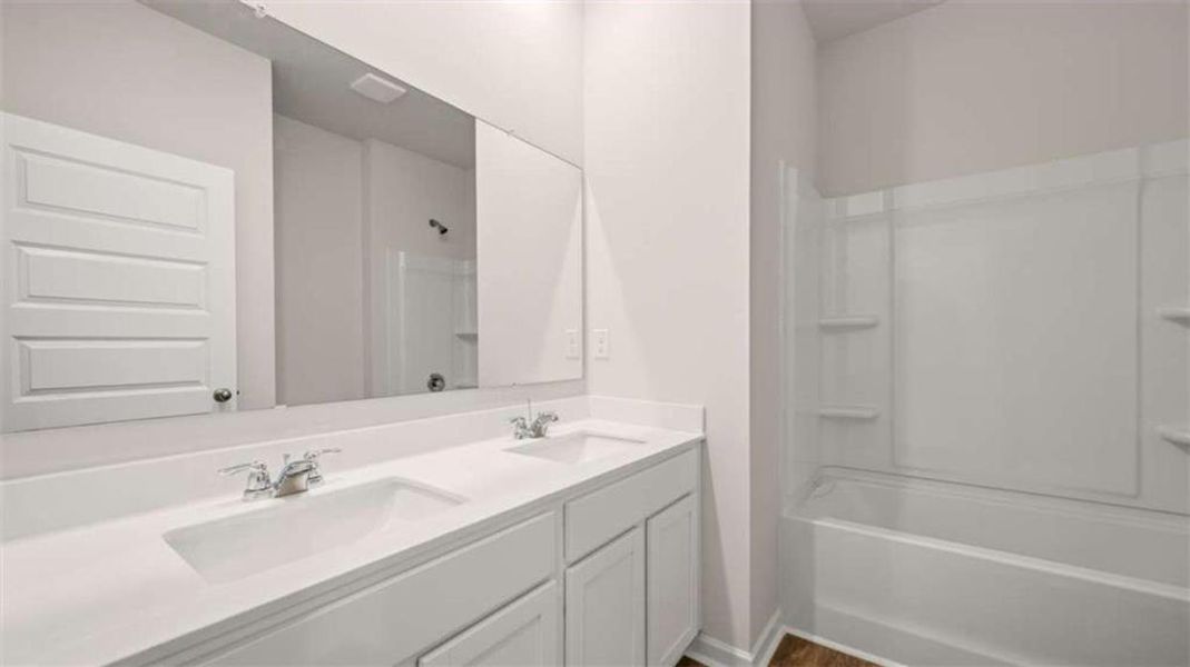 Furnished interior view inside a new home in Brooks Station, Dacula (Image 3). Furnished interior view inside a new home in Brooks Station, Dacula (Image 3).