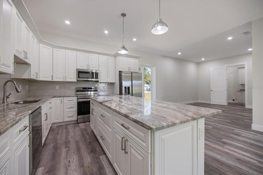 Furnished interior view inside a new home in , Sarasota (Image 32).