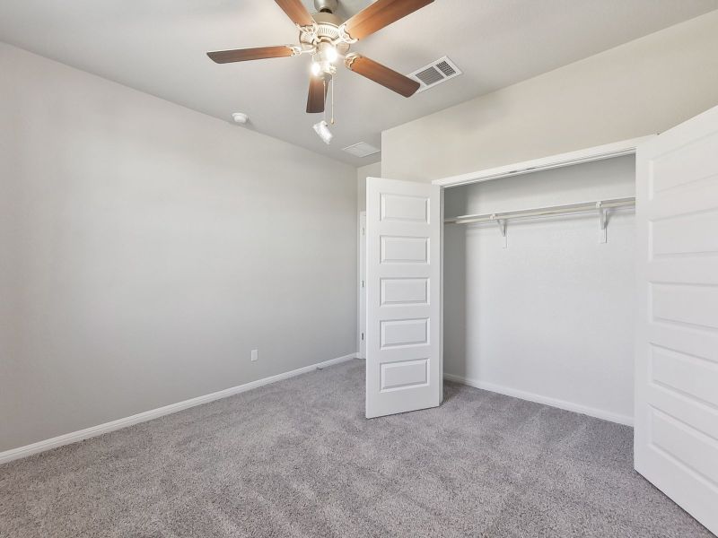 Spacious, unfurnished interior of a new home in Big Sky Ranch - Executive Collection, Dripping Springs (Image 15).