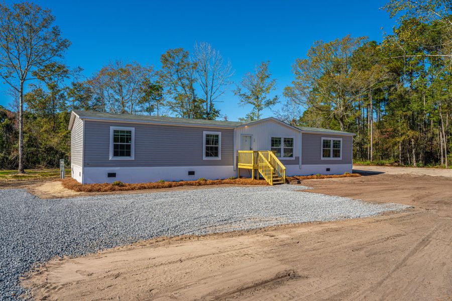 Exterior details and patio area of a home in , Pinopolis (Image 18).