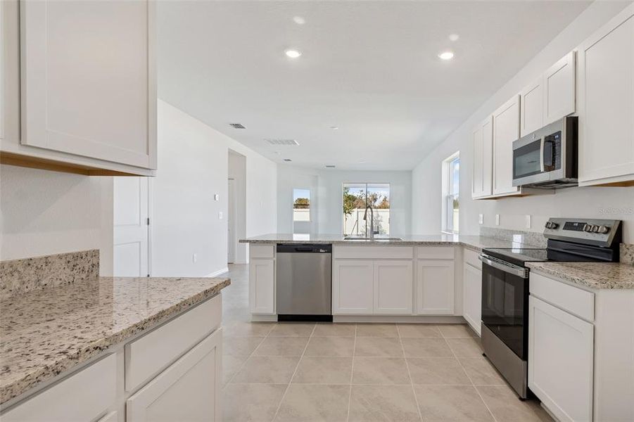 Furnished interior view inside a new home in Southpointe, Palmetto (Image 9).