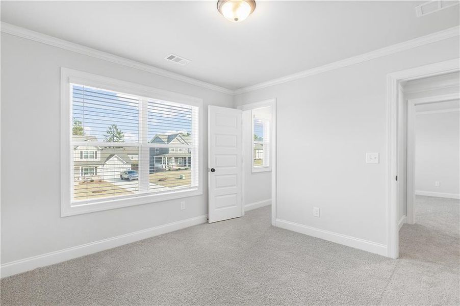 Spacious, unfurnished interior of a new home in Calgary Downs, Winder (Image 33).