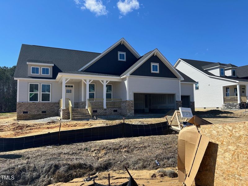 Front exterior of a new home in Tobacco Road, Angier, NC, highlighting curb appeal (Image 36).
