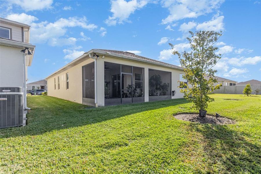 Exterior details and patio area of a home in Tohoqua Reserve, Kissimmee (Image 22).