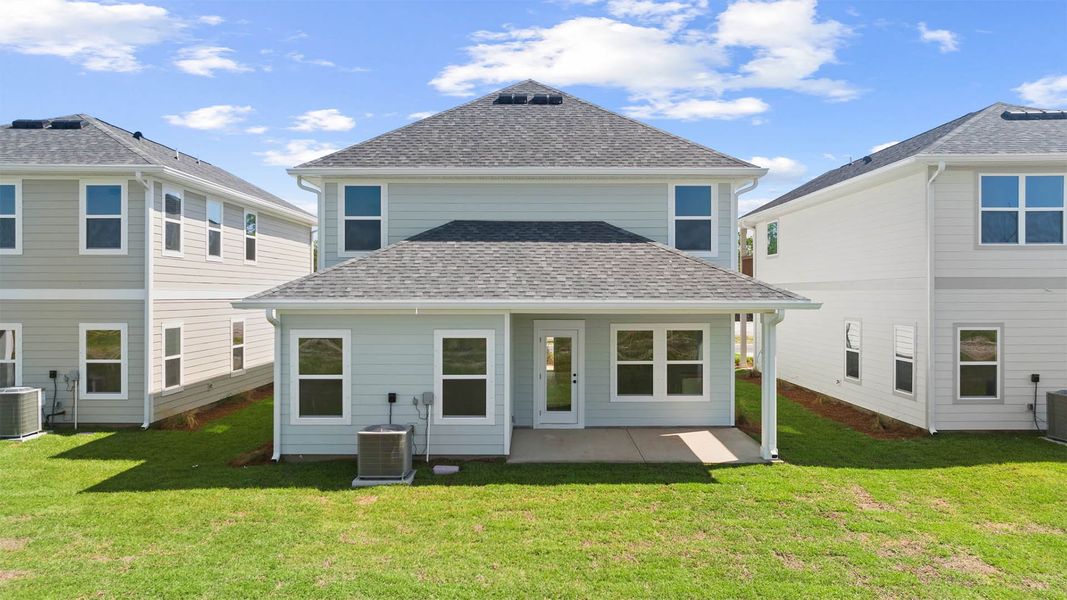 Exterior details and patio area of a home in Colonial East, Panama City Beach (Image 2). Exterior details and patio area of a home in Colonial East, Panama City Beach (Image 2).