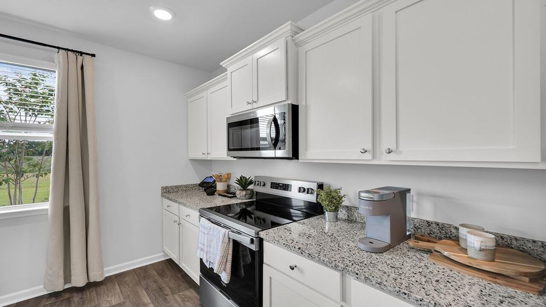 Furnished interior view inside a new home in The Ranch, Holly Hill (Image 10).