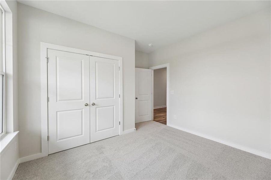 Spacious, unfurnished interior of a new home in The Park at Brighton, Locust Grove (Image 33).