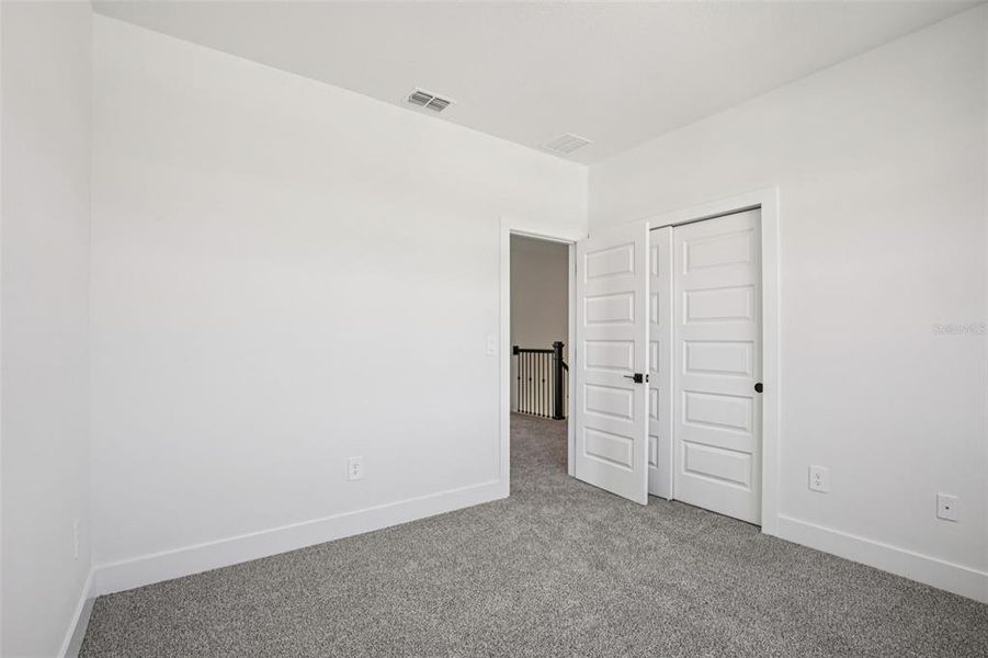 Spacious, unfurnished interior of a new home in Magnolia Bay - Reserve Series, Nokomis (Image 25).