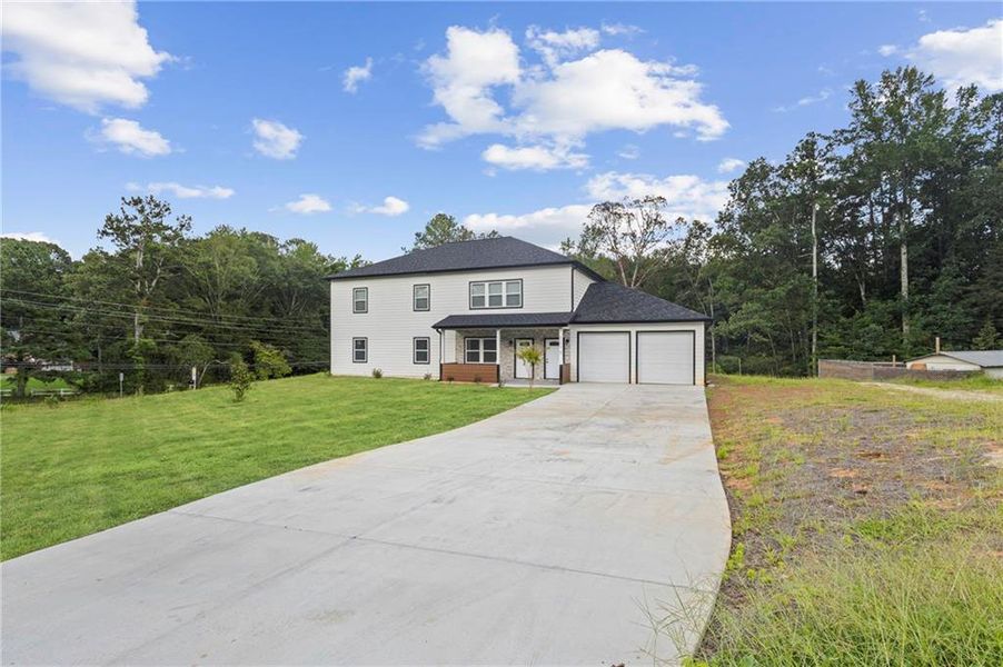 Front exterior of a new home in , Sugar Hill, GA, highlighting curb appeal (Image 19).