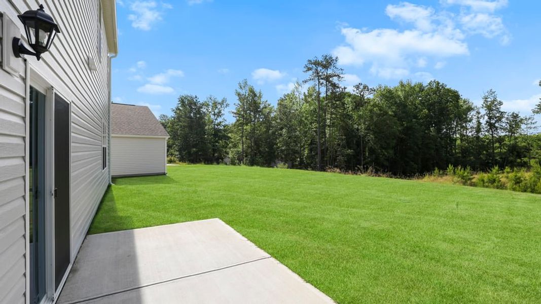 Exterior details and patio area of a home in Hunters Ridge, Woodruff (Image 21).