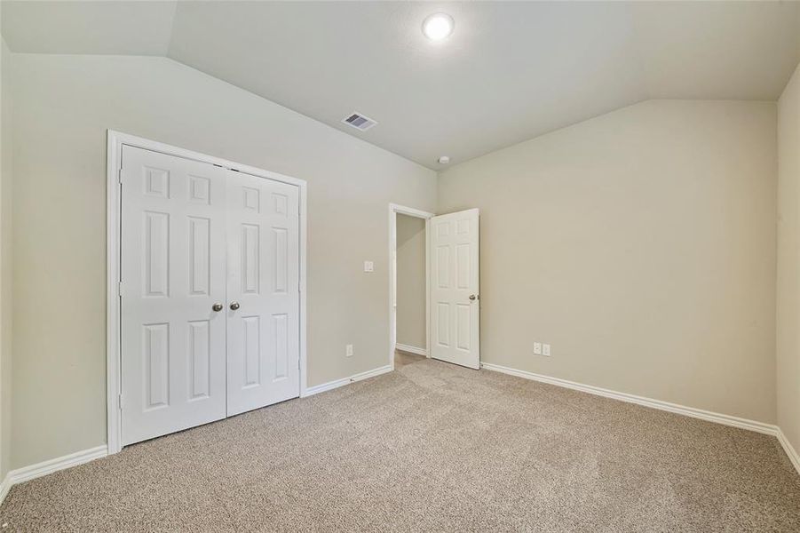 Guest bedroom with double door closet