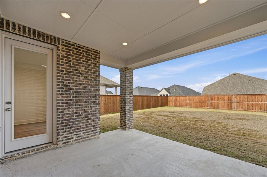 Exterior details and patio area of a home in Waterscape: 50ft. lots, Royse City (Image 16).