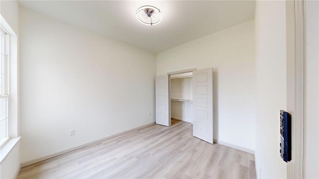 Spacious, unfurnished interior of a new home in , Point (Image 27).