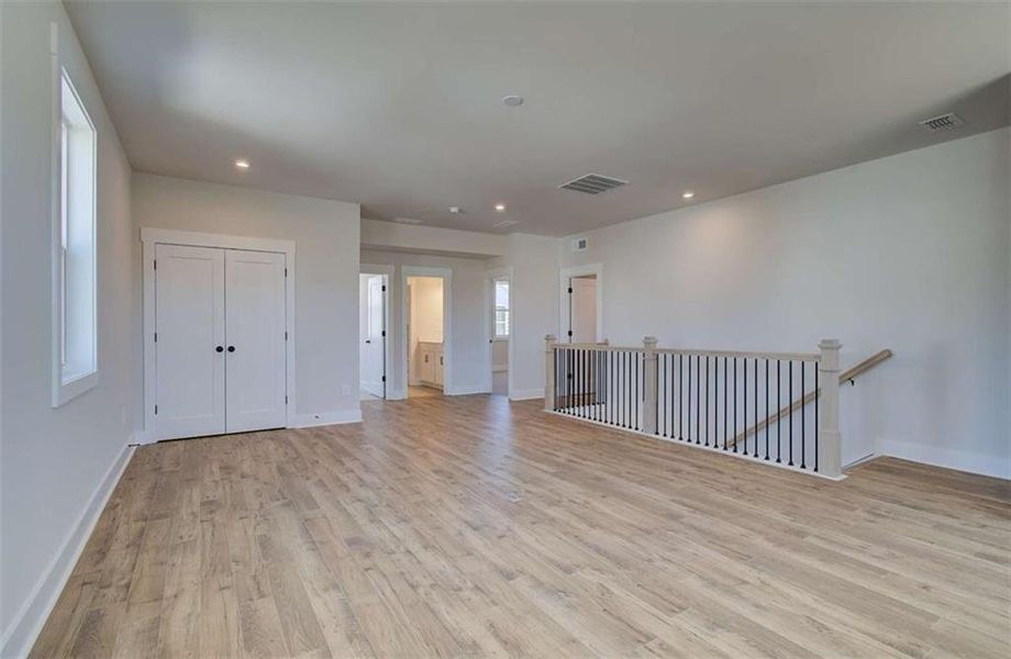 Spacious, unfurnished interior of a new home in The Paddocks at Doc Hughes, Buford (Image 36).