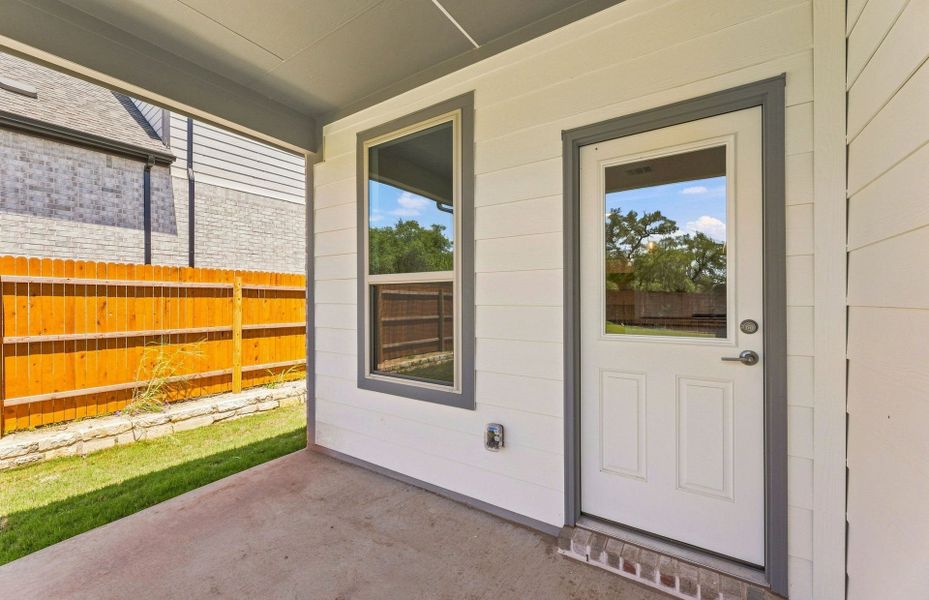 Exterior details and patio area of a home in Saddleback at Santa Rita Ranch, Liberty Hill (Image 29).
