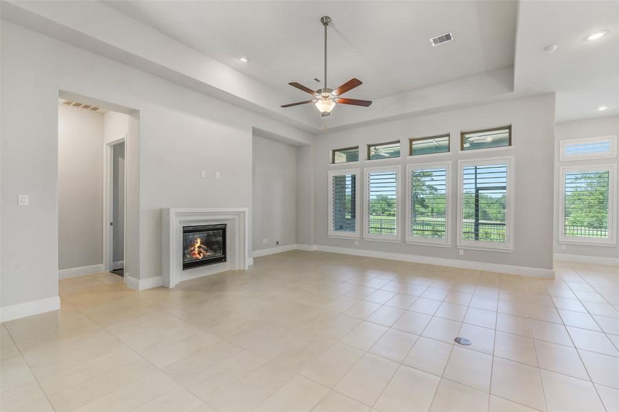 The living area has gas fireplace with a modern cast fireplace surround. There is an additional 110V outlet for TV hookup. In fact, this well planned home has six extra 110V Outlets and a floor plug in the family room. The living area has gas fireplace with a modern cast fireplace surround. There is an additional 110V outlet for TV hookup. In fact, this well planned home has six extra 110V Outlets and a floor plug in the family room.