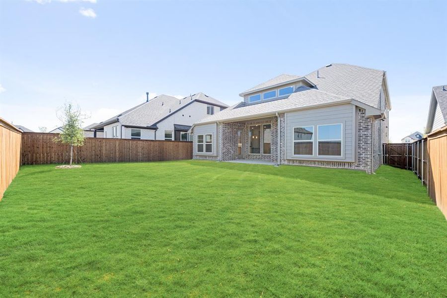 Exterior details and patio area of a home in Creekview Meadows, Pilot Point (Image 27).