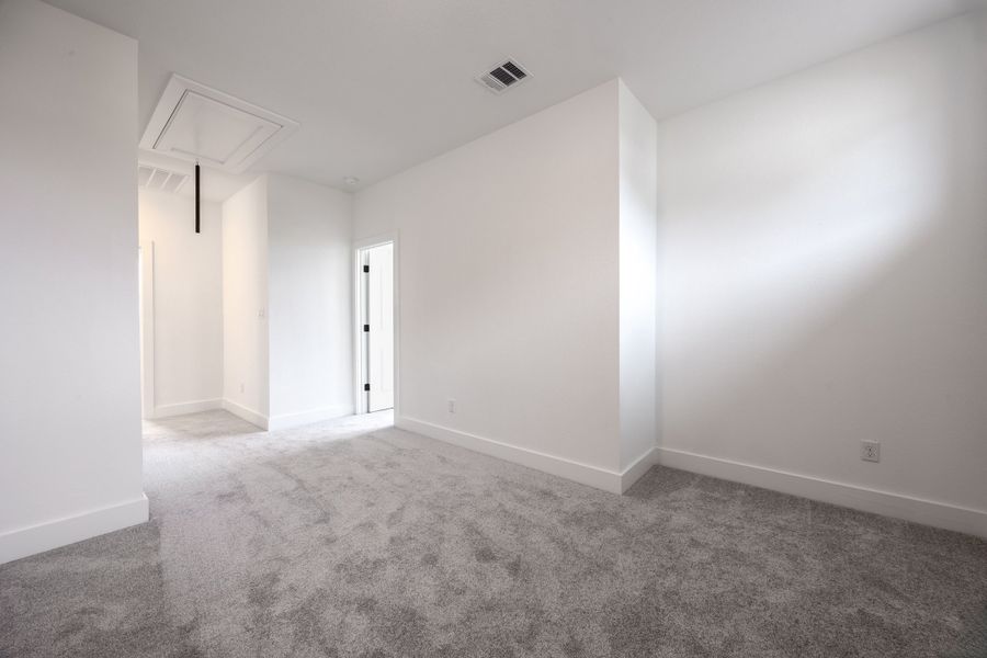 Spacious, unfurnished interior of a new home in Sage Collection – Freedom at Anthem, Kyle (Image 15).