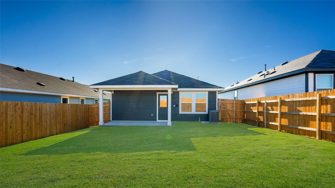 Front exterior of a new home in Marigold, Uhland, TX, highlighting curb appeal (Image 2). Front exterior of a new home in Marigold, Uhland, TX, highlighting curb appeal (Image 2).