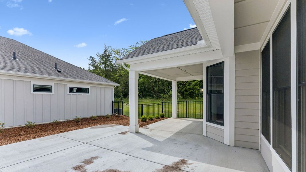 Exterior details and patio area of a home in The Courtyards at Stewarts Creek, Smyrna (Image 3).