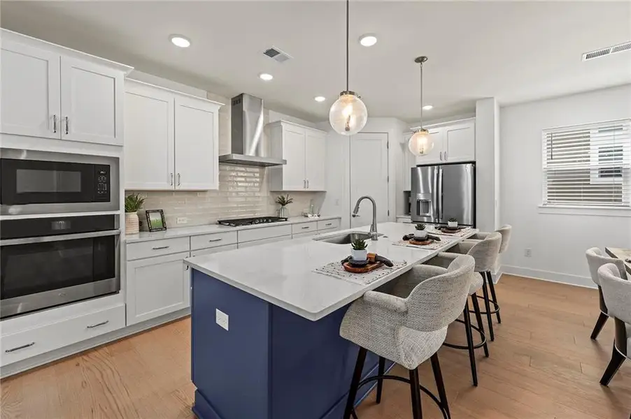 Furnished interior view inside a new home in Crescent Pointe at Great Sky, Canton (Image 8).