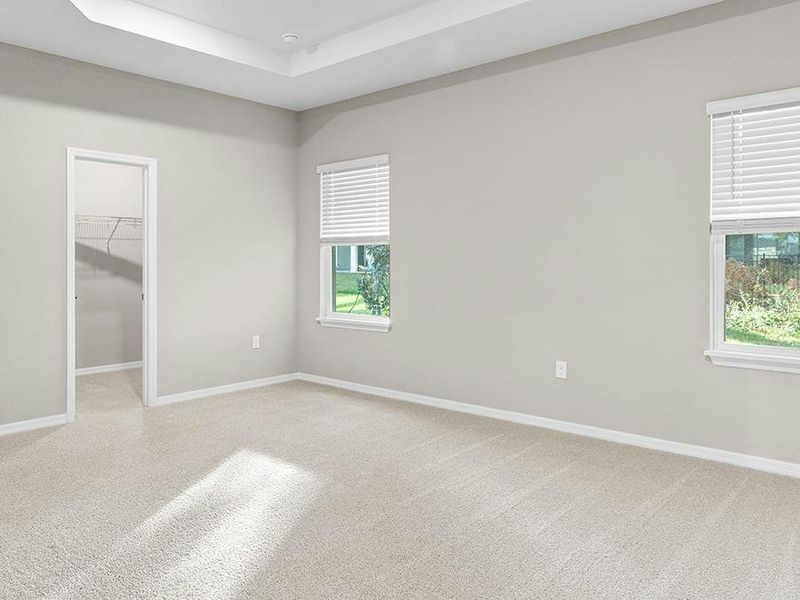 Relax in your beautiful owner`s suite complete with a tray ceiling, a walk-in wardrobe, and an en-suite bath.