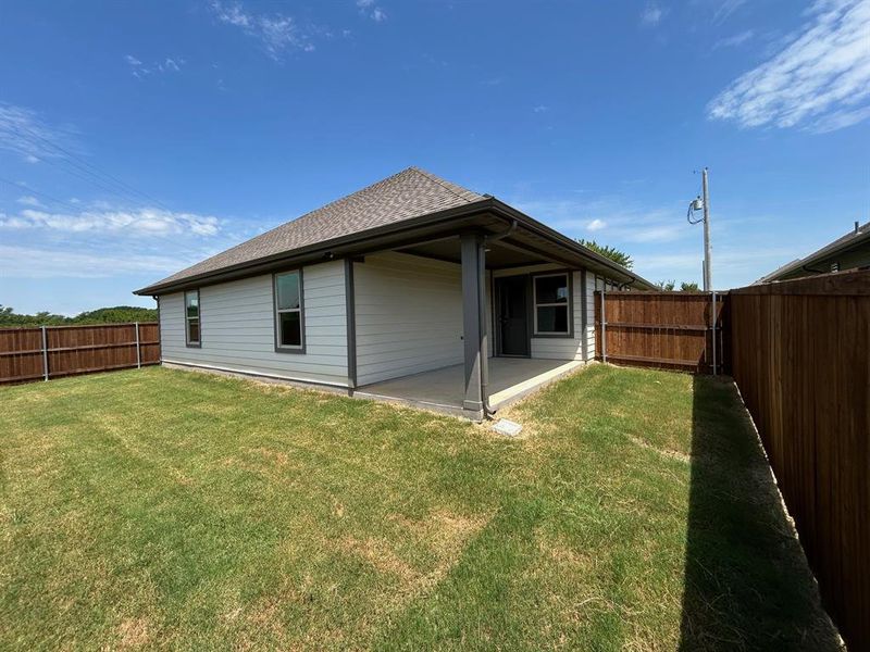Front exterior of a new home in , Trenton, TX, highlighting curb appeal (Image 22). Front exterior of a new home in , Trenton, TX, highlighting curb appeal (Image 22).