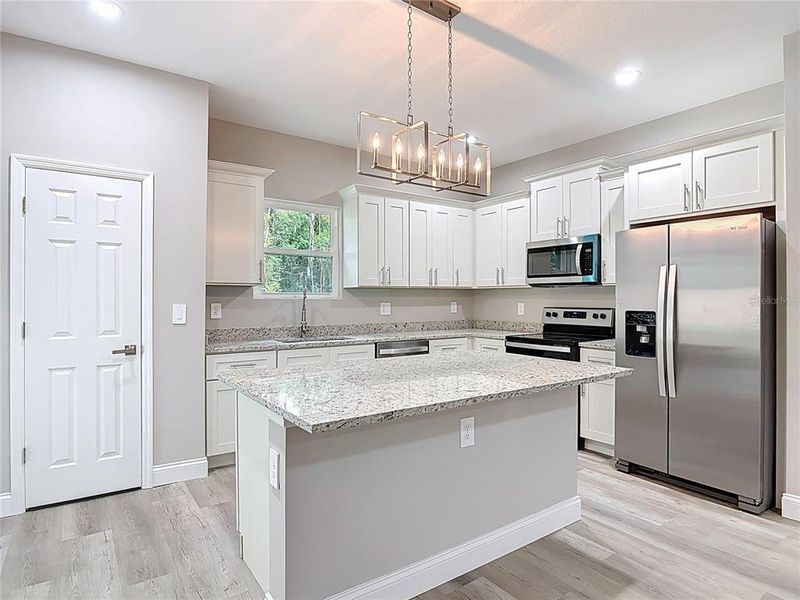 Furnished interior view inside a new home in , Deland (Image 9).