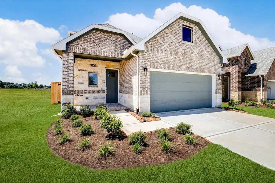 Front exterior of a new home in , Waller, TX, highlighting curb appeal (Image 2).