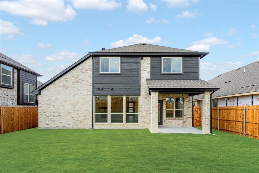 Exterior details and patio area of a home in Anderson Crossing, Trenton (Image 3). Exterior details and patio area of a home in Anderson Crossing, Trenton (Image 3).