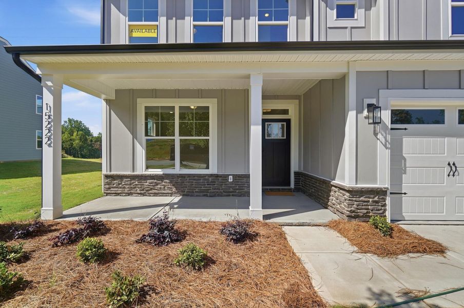 Exterior details and patio area of a home in Enclave at Riverdale, Huntersville (Image 3).