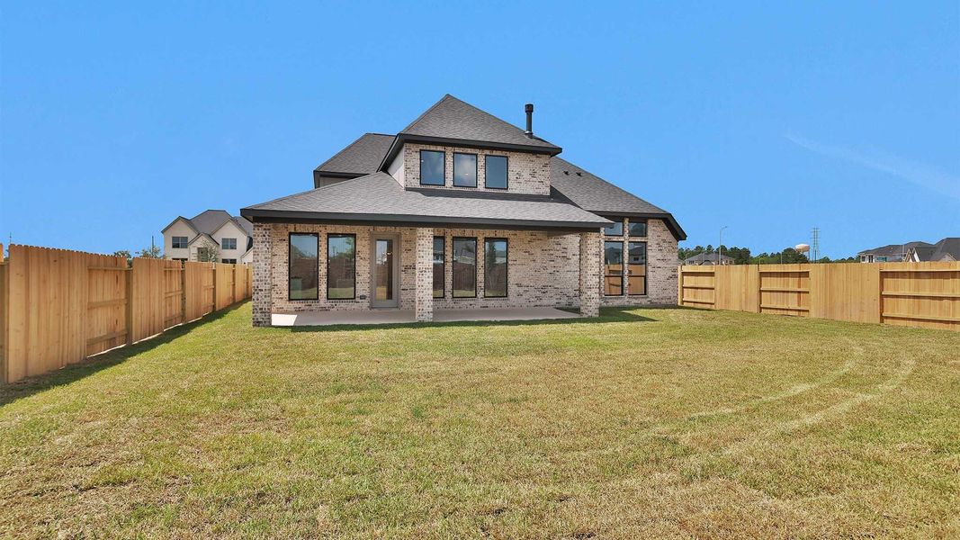 Exterior details and patio area of a home in Legacy Prairie at Katy Court, Katy (Image 3).