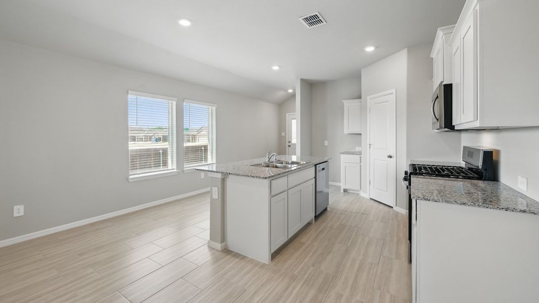 Furnished interior view inside a new home in Monarch at the Meadows, Ponder (Image 9).