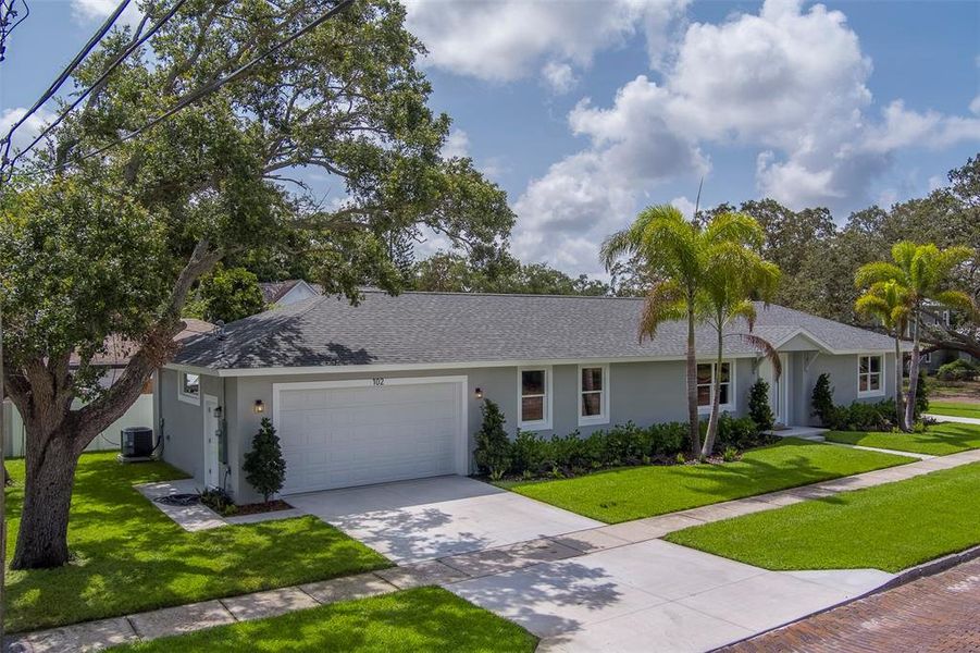 Front exterior of a new home in , Largo, FL, highlighting curb appeal (Image 23).