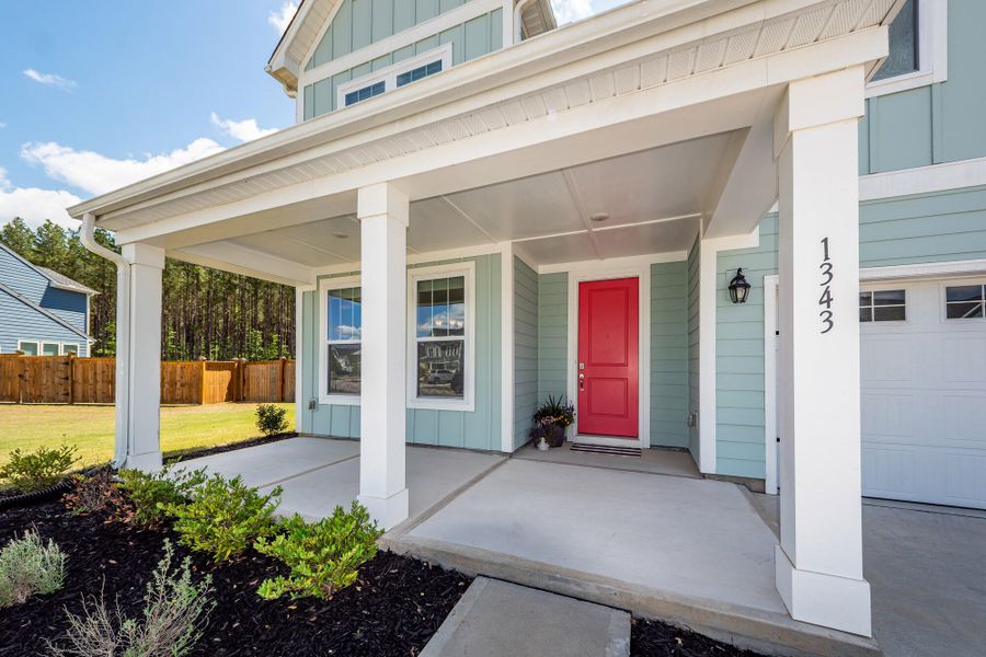 Exterior details and patio area of a home in , Ravenel (Image 3). Exterior details and patio area of a home in , Ravenel (Image 3).