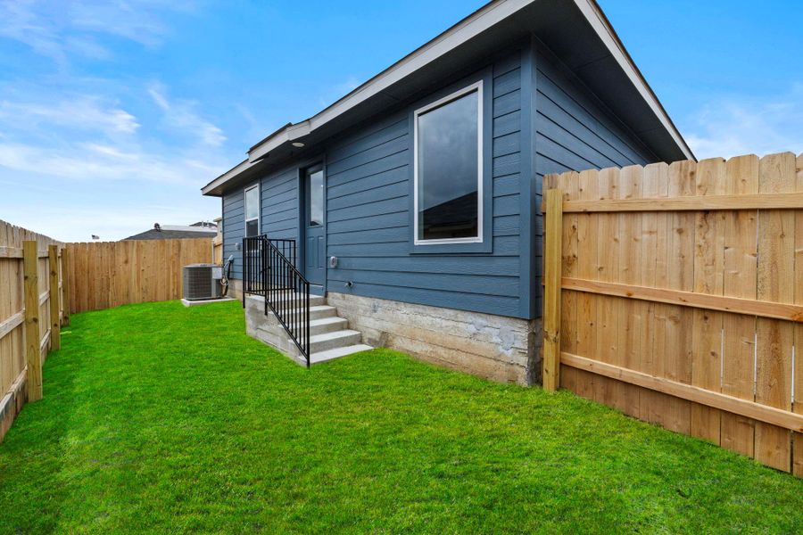 Exterior details and patio area of a home in Sunset Oaks, Maxwell (Image 3).