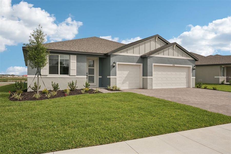 Front exterior of a new home in Oakfield Trails - Signature Series, Parrish, FL, highlighting curb appeal (Image 19).