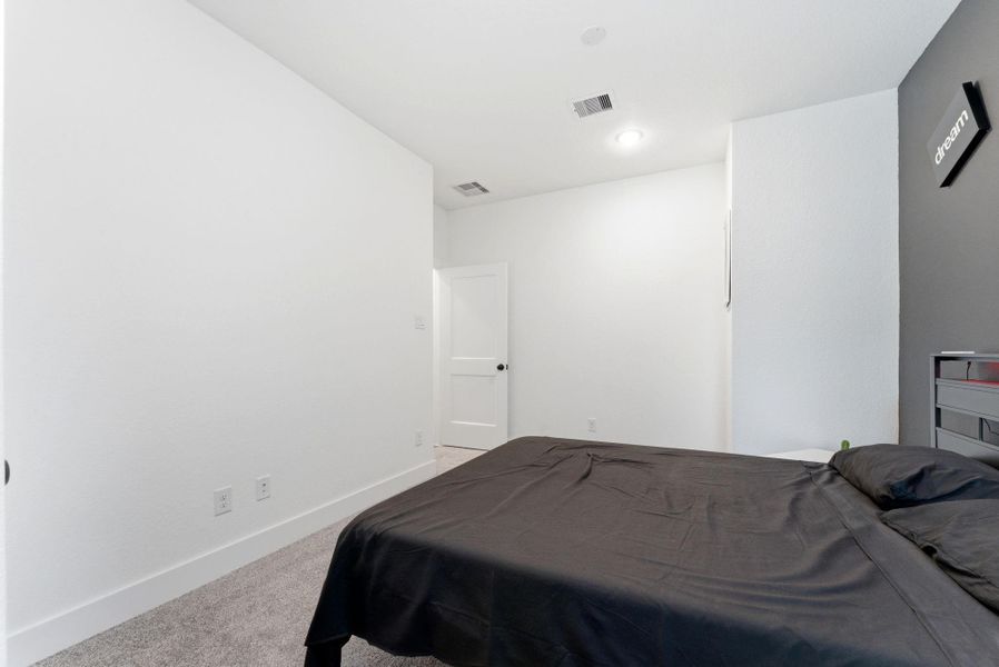 Another view of the secondary bedroom.