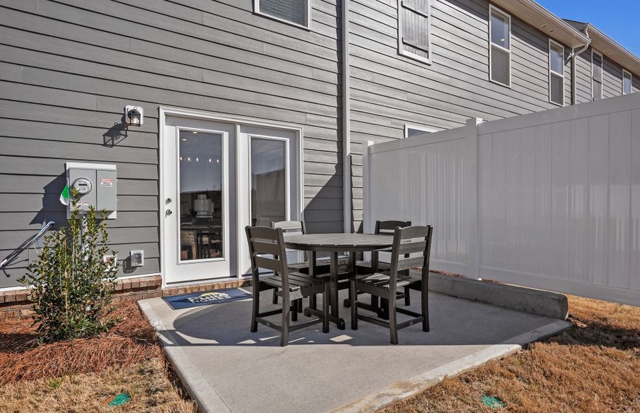 Exterior details and patio area of a home in Riverstone, Monroe (Image 3). Exterior details and patio area of a home in Riverstone, Monroe (Image 3).