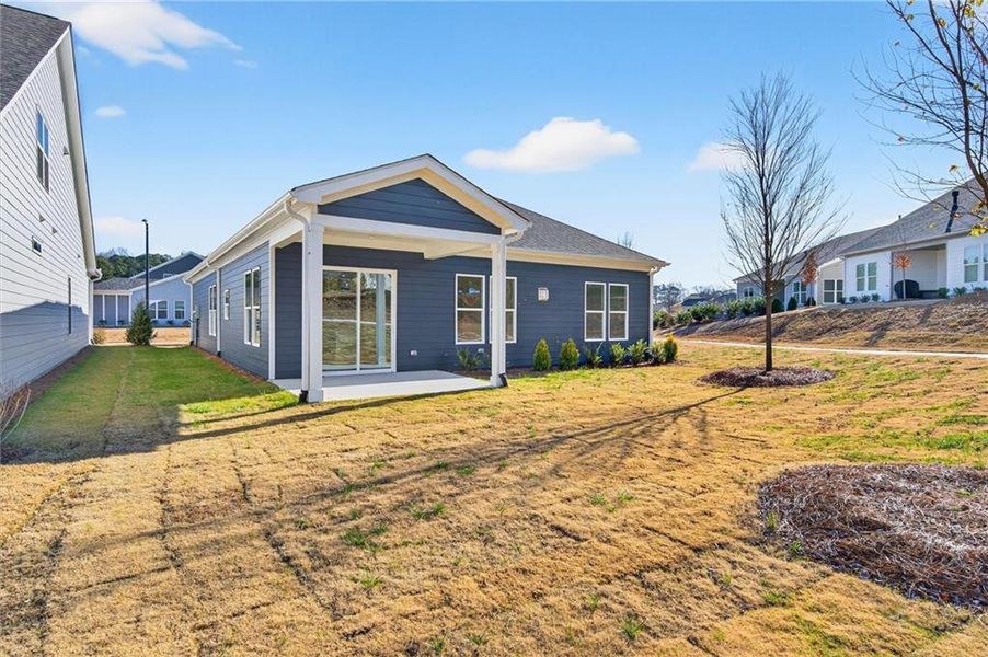Exterior details and patio area of a home in The Reserve at Bells Ferry, Kennesaw (Image 20).