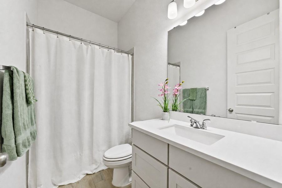 Furnished interior view inside a new home in Artavia, Conroe (Image 31).