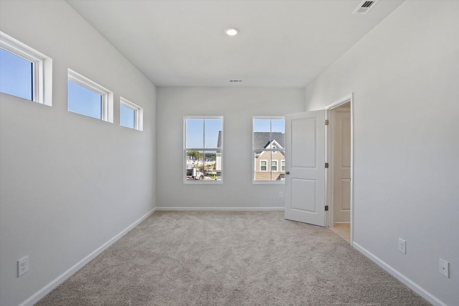 Spacious, unfurnished interior of a new home in Renaissance at White Oak, Garner (Image 18).