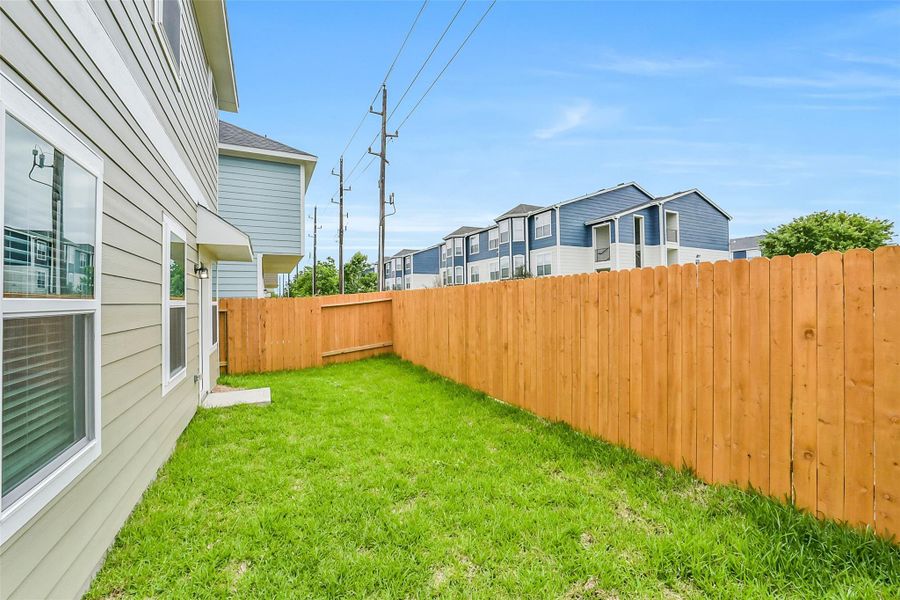 Exterior details and patio area of a home in , Houston (Image 26). Exterior details and patio area of a home in , Houston (Image 26).
