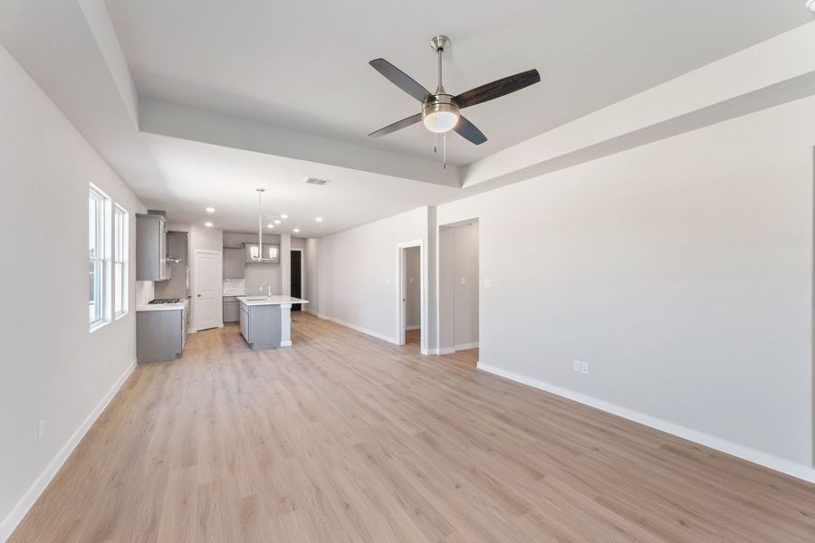 Spacious, unfurnished interior of a new home in Hunters Ranch, San Antonio (Image 11).