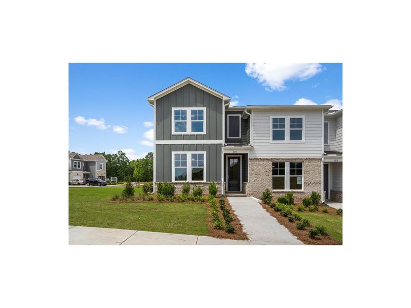 Front exterior of a new home in Stegall Village, Cartersville, GA, highlighting curb appeal (Image 1). Front exterior of a new home in Stegall Village, Cartersville, GA, highlighting curb appeal (Image 1).