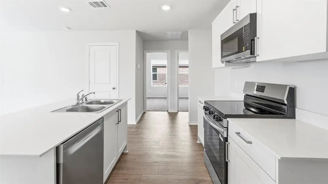 Furnished interior view inside a new home in Asher Oaks, Bonham (Image 6).