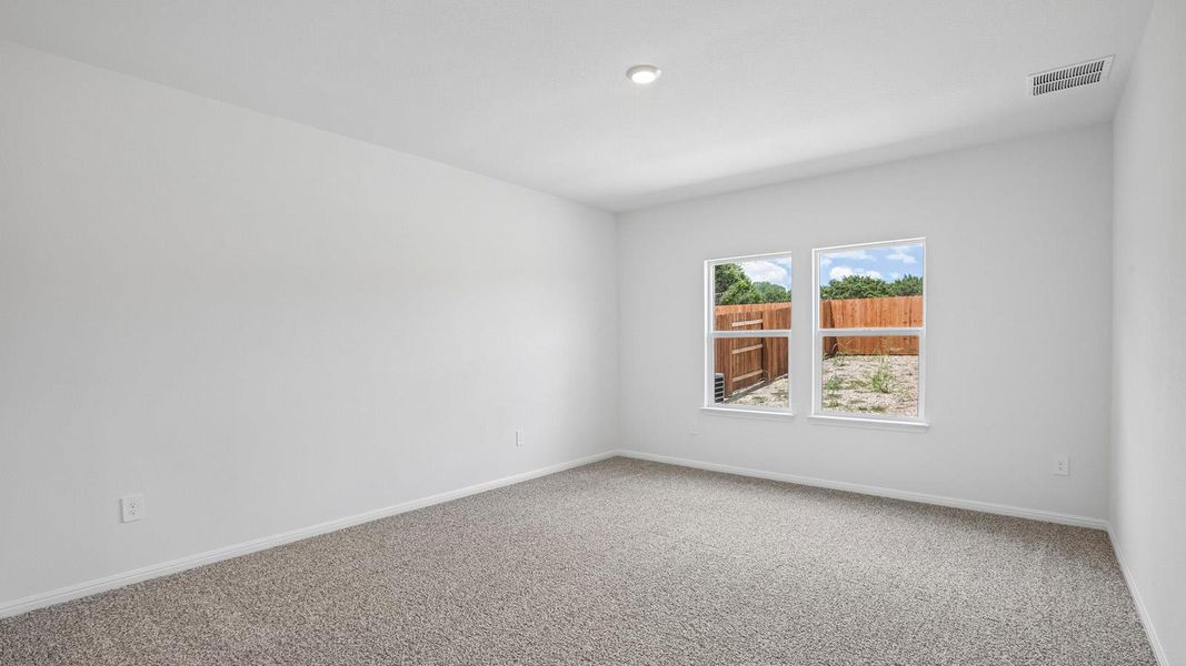 Spacious, unfurnished interior of a new home in Bar W Ranch, Leander (Image 21).